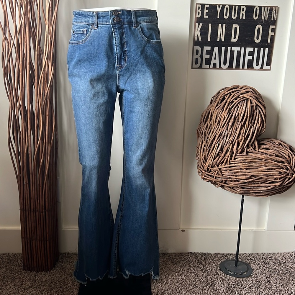 Cato High Rise Flare Jeans With Splits and Notched Frayed Hem.